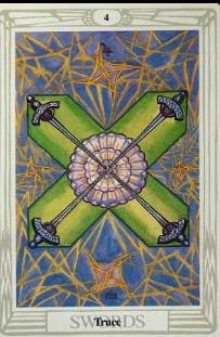 A painting of a cross and shell on the front of a window.